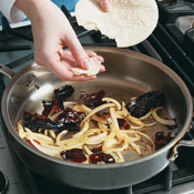 To enhance flavor, saut&eacute; onion, dried chiles, and tortilla pieces before adding the broth and tomatoes.