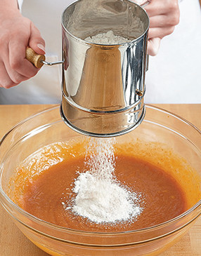 Sifting flour before adding it to the batter adds air to the mixture, which makes for fluffier batter and lighter bars after baking.