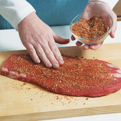 Rub both sides of the flank with the spice mixture. Don&rsquo;t worry if it doesn&rsquo;t cover every inch.