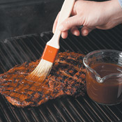 Basting merges the flavors of the sauce and the spice mix, and gives the steak an appetizing glaze.