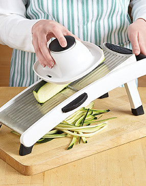 For the best texture, instead of shredding, julienne the zucchini on each side until you reach the seeds.