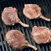 Start grilling chops directly over medium-high heat with bones facing 4 o'clock. 
