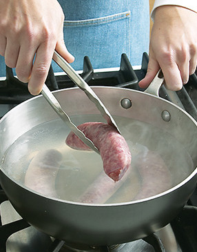 Precook the brats before grilling to prevent them from splitting and to shorten grilling time.