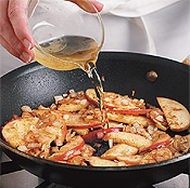 Once the apples have sautéed, stir in the apple juice and lemon juice and simmer until apples soften.