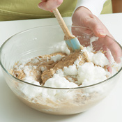 Gently fold the egg whites into the batter. Overfolding will cause the whites to lose their volumizing effect.
