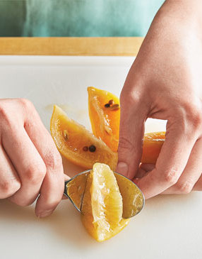 To use the preserved lemons, rinse them to remove some of the salt. Then quarter them, and if necessary, separate the pulp from the peel using a spoon.