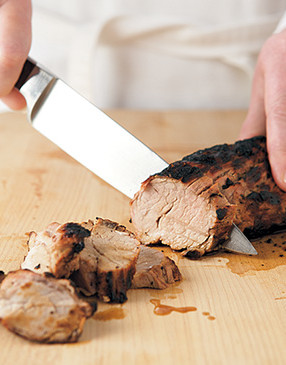 Cut pork along the grain into &frac12;-inch-thick slices. Cover half of each tortilla with a few slices of pork.