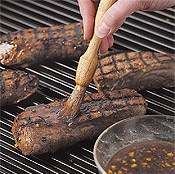 Brush steaks with the remaining marinade during grilling to help the meat caramelize. 