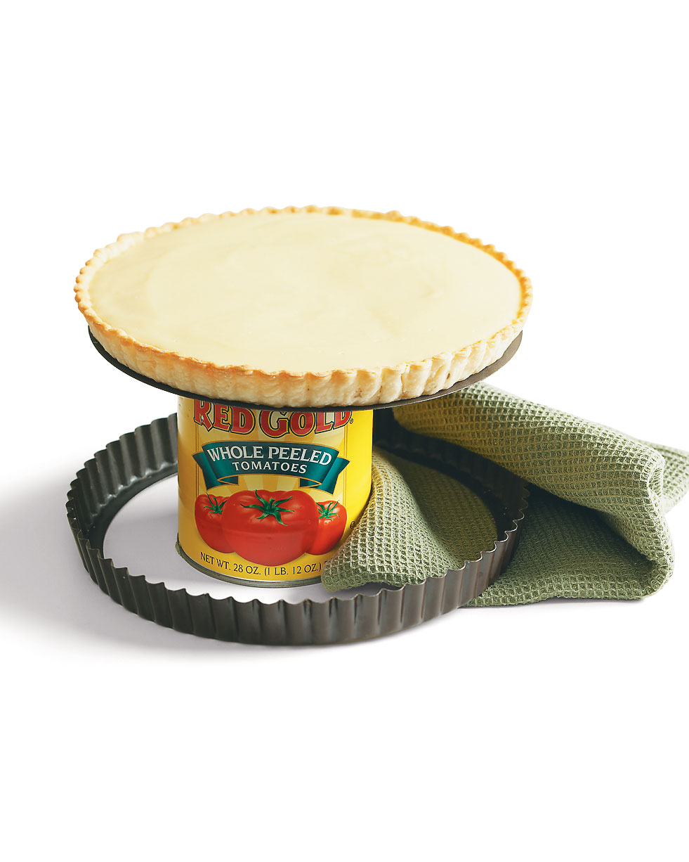 Easily separate a tart from its pan by setting the base on a large can to cool.