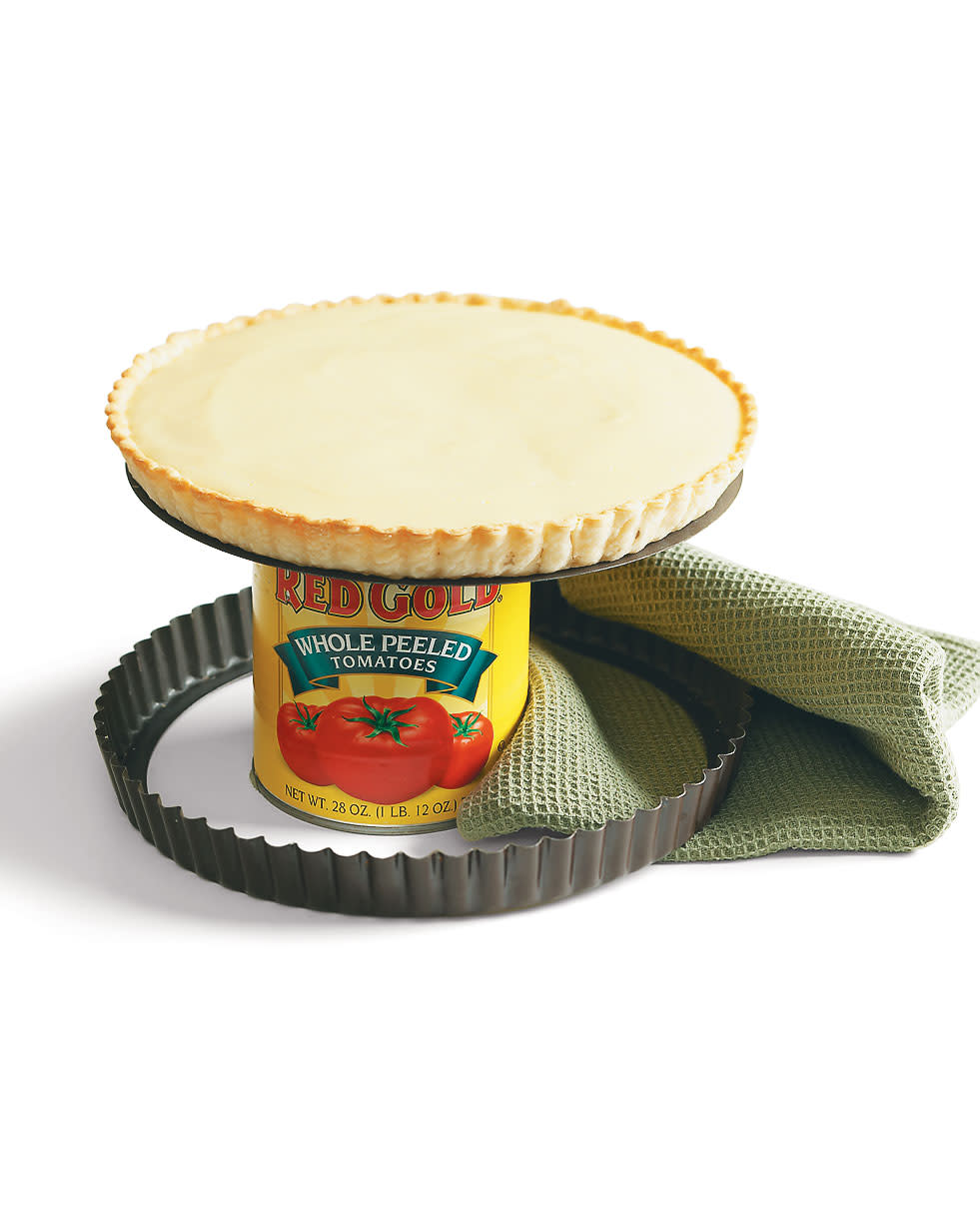 Easily separate a tart from its pan by setting the base on a large can to cool.