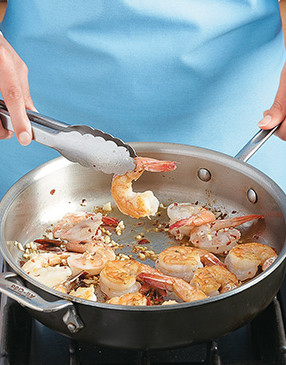 Saut&eacute; shrimp quickly, just 1 minute per side so they don't get rubbery &mdash; they'll finish cooking later.