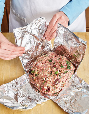 Folding a foil sling for Instant Pot Mediterranean meatloaf