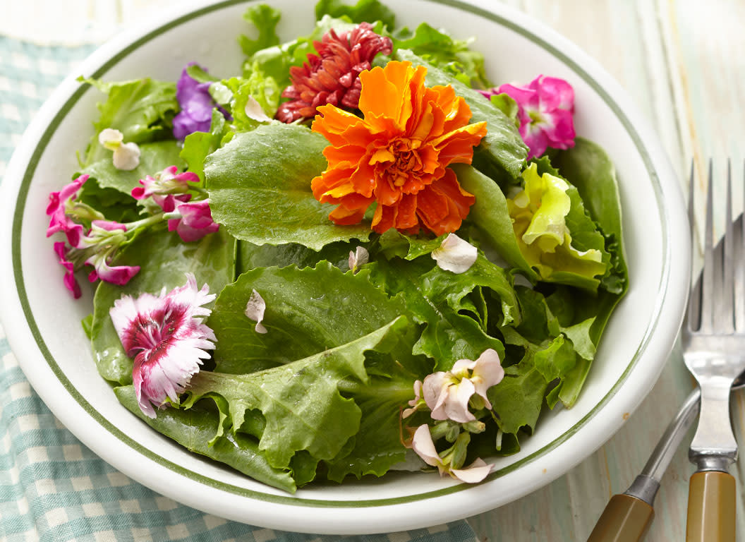Which flowers are edible? All about identifying, buying, growing, and eating edible flowers.