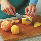 To peel citrus, cut off the top and bottom, then cut the peel away, following the curve of the fruit. 