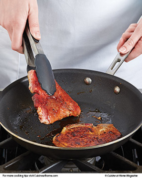 Keep an eye on the chops — they are thin, will cook quickly, and the sugar in the rub will burn.