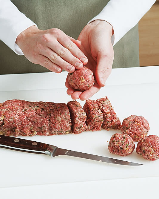Here's a quick, easy, and tidy way to make uniform meatballs without the use of a scoop.