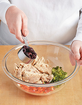 Add flavor while keeping sodium levels in check by mixing in briny olives instead of seasoning with salt.
