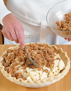 Finely chop the walnuts for the crisp so slicing the pie without smashing the apples is possible.