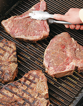 For crosshatch marks, arrange the steaks at a 45-degree angle to the grate and grill 1 minute, then rotate.