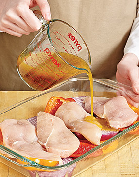 A baking dish is the perfect vehicle for holding the chicken breasts and vegetables while they marinate.