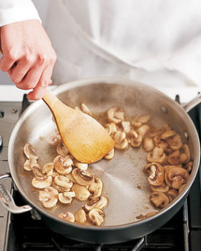 Sauté mushrooms, stirring often, until they release their moisture and begin to brown.