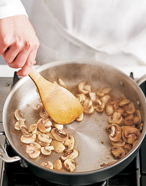 Sauté mushrooms, stirring often, until they release their moisture and begin to brown.