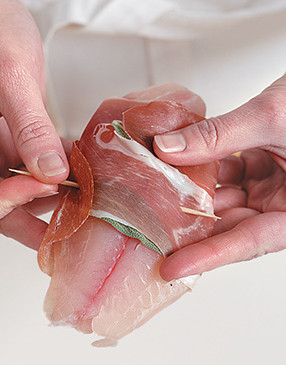 Wrap prosciutto around each sage-topped fillet; secure with long toothpicks by threading in one side and out the other.