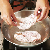 Dredge the chicken in plenty of flour; as it sautés it forms a crust and thickens the soda into a glaze.
