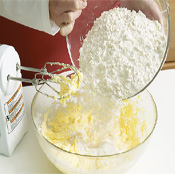 Blend flour mixture into butter in two additions, taking care not to overmix. Chill dough before rolling out.