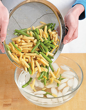 To prevent overcooking, shock the beans in a bowl of ice water as soon as they're blanched.