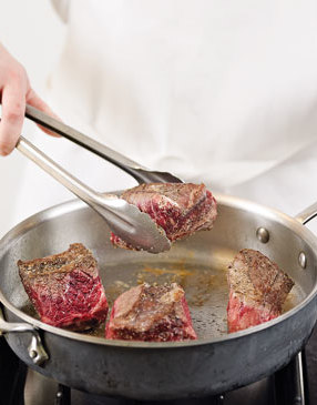 Brown the ribs on all sides in a sauté pan large enough that the meat isn't crowded.