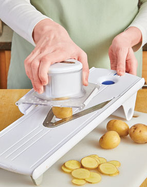 Use a mandoline to make quick work of thinly slicing uniform-sized potatoes.