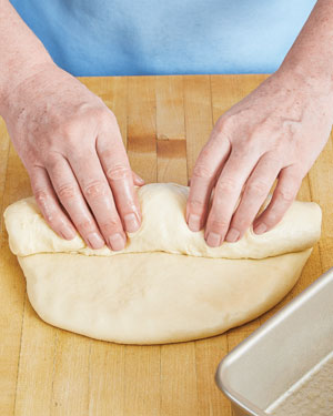 Shaping a milk bread loaf