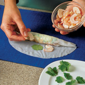 Arrange the shrimp cut side up so the pretty side of the shrimp is visible when the roll is completed.