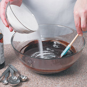 Stir the sugar, vanilla, and salt into the melted chocolate mixture.