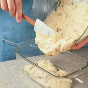 Immediately pour the batter into the prepared pan, using a spatula  to guide the mixture into the pan.