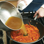 Stir vinegar mixture into stir-fried vegetables and cook until thickened. Add broth and simmer briefly.