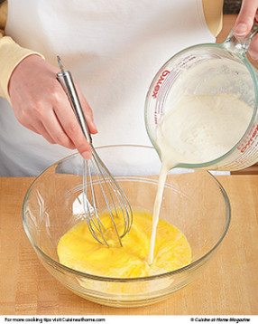 To prevent curdling the egg yolks, whisk in a portion of the hot liquid before returning to the heat.