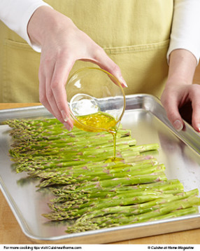 To add flavor to the asparagus, drizzle it with a mixture of garlic and olive oil before roasting.
