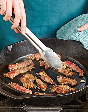 Overcrowding the pan causes the steak to steam. To avoid that, sear it in batches to caramelize the slices.