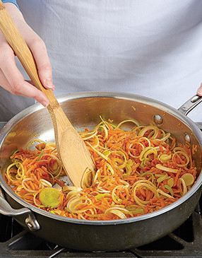 Sautéing the carrots, leeks, and ginger over high heat first helps release their flavors quickly.