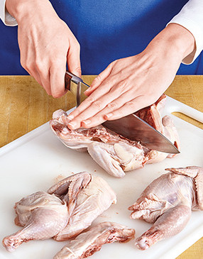 Cutting through the breastbone takes some muscle, but a large, sharp knife helps ease the task.