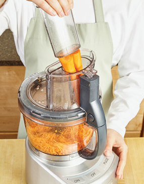 For the best texture and to make quick work, use a food processor to shred the whole carrots.