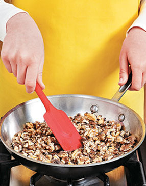 Toast the walnuts in a dry sauté pan over medium heat, stirring constantly, until aromatic.