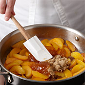After the apricots have cooked down a bit, stir in the preserves and brown sugar until melted.