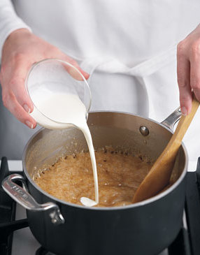 Stir in the cream and vanilla. The caramel will bubble furiously. Keep stirring to combine ingredients. 
