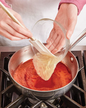Adding gelatin to the strawberry purée helps it set up and create a firm, clean layer of topping.