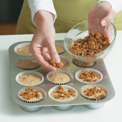 Sprinkle about two teaspoons streusel topping onto each of the muffins before baking.