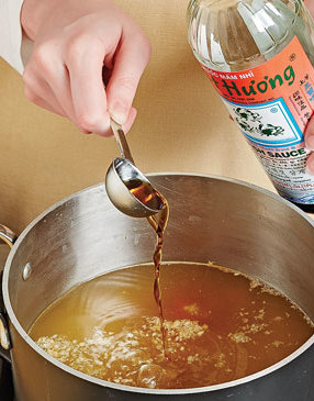 Fish sauce adds flavor and saltiness. Add 1 tablespoon, adjusting with more once the soup has cooked.
