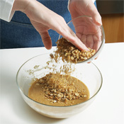 Add granola to the batter and stir just to combine. Overmixing makes cakes tough and chewy.